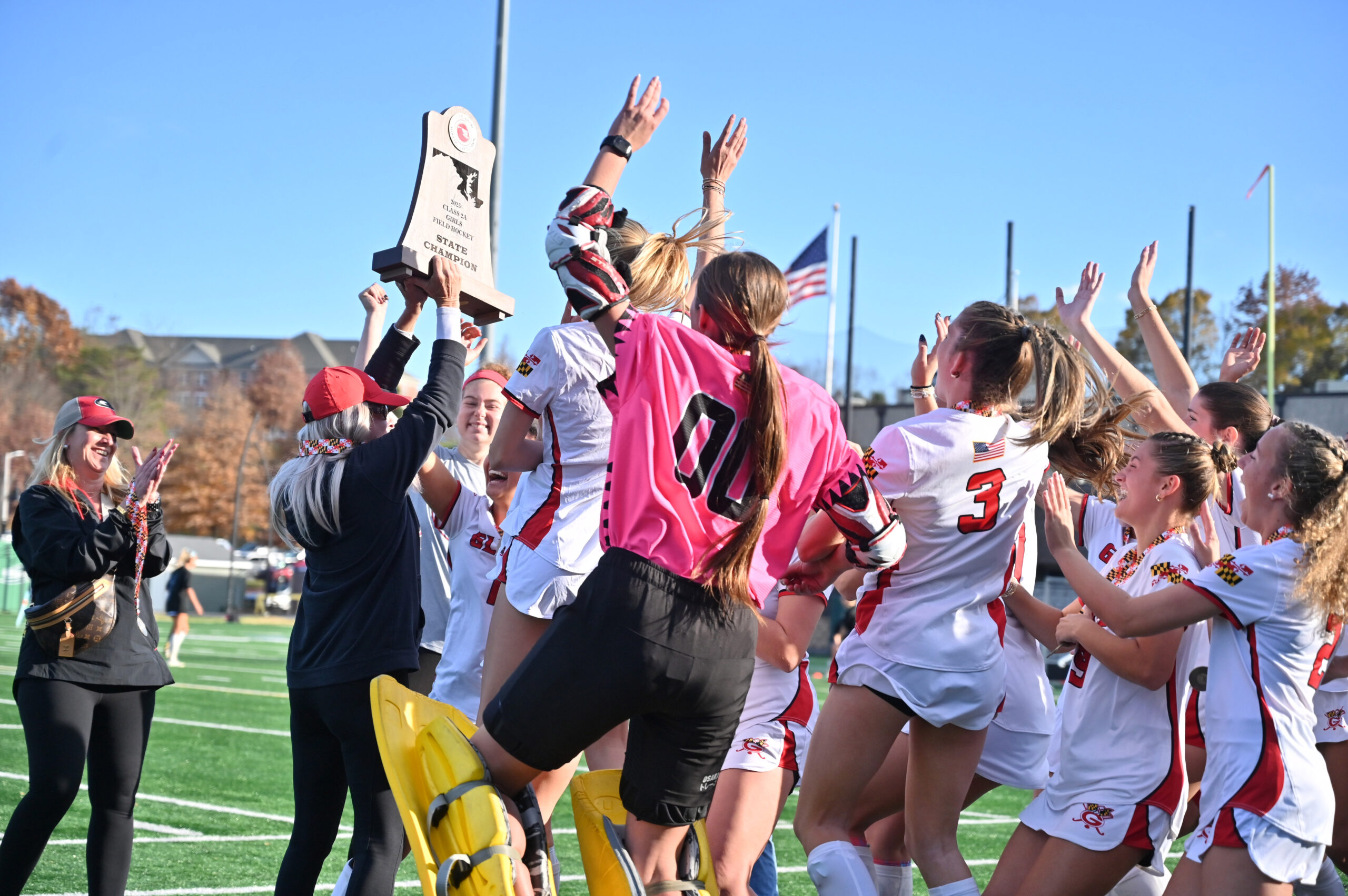 Glenelg's field hockey team celebrates following their win over Manchester...