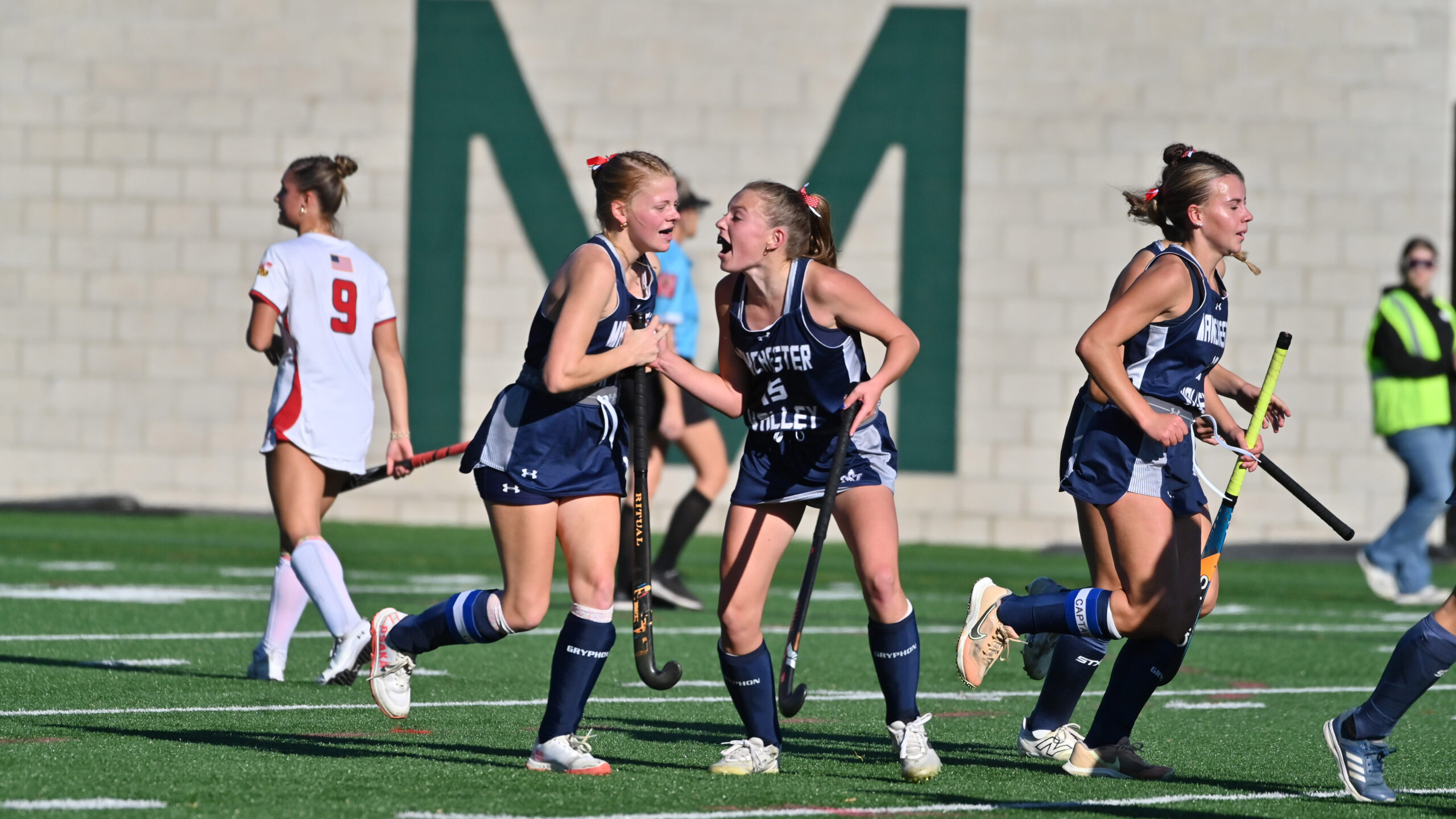 Manchester Valley's Amanda Herrold, left, celebrates a goal with teammate...