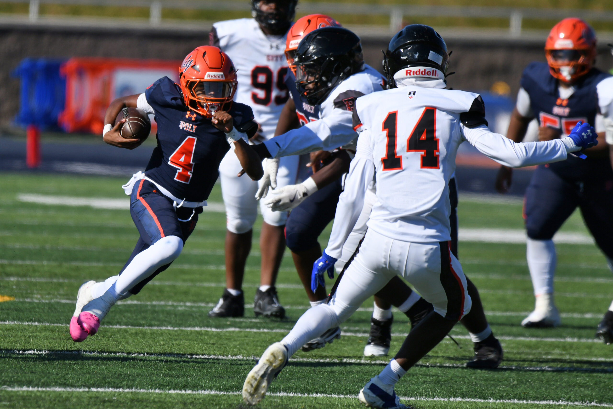 Poly quarterback Troy Brown Jr. runs the ball in the...