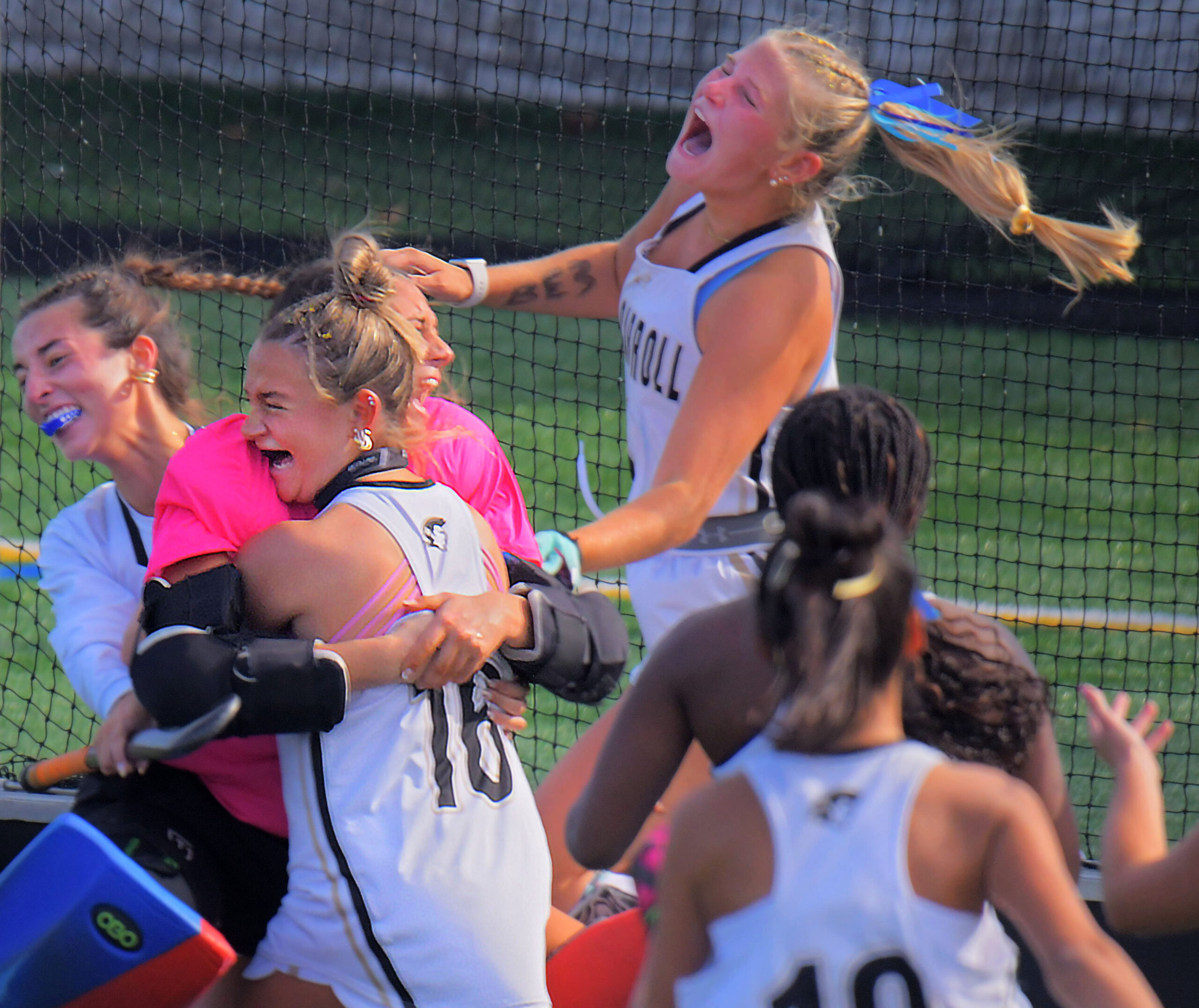 John Carroll Patriots midfielder/forward Katie Wein, left and defender/forward Cate...