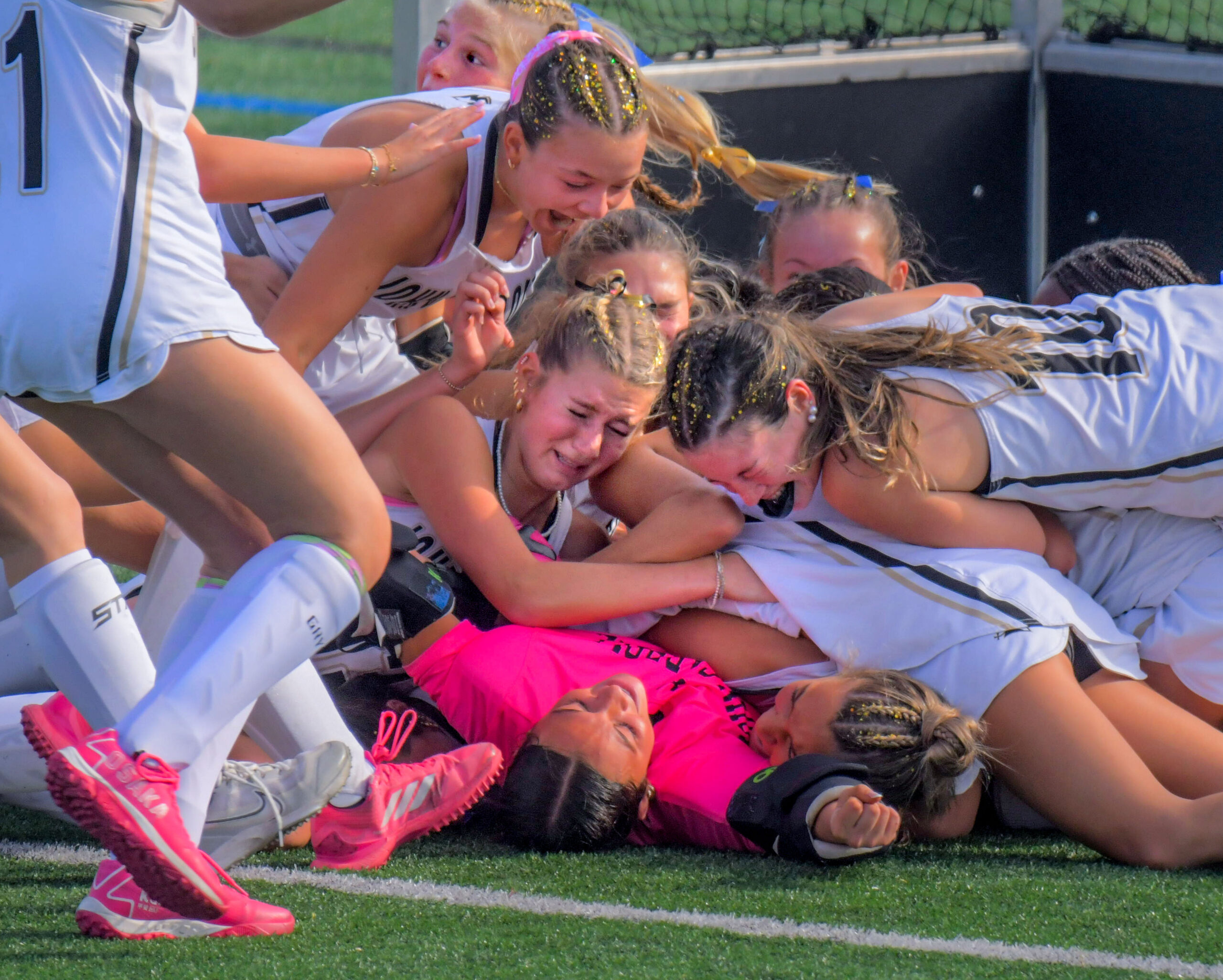 John Carroll Patriots midfielder/forward Paige Freeburger, left and defender/midfielder Molly...