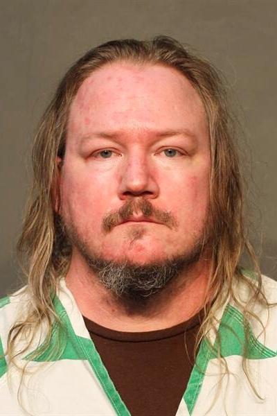 FILE – This booking photo provided by the Des Moines,...