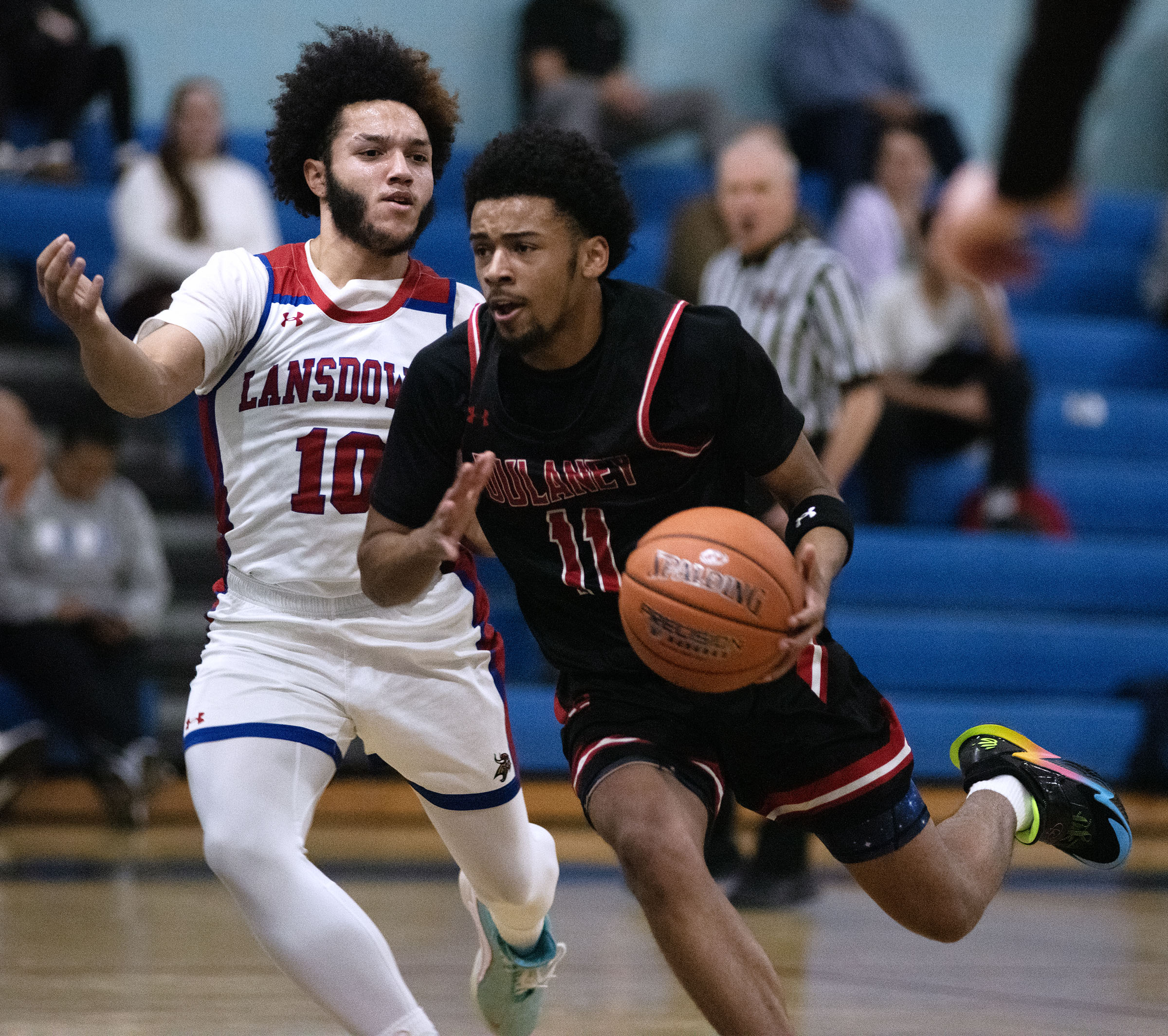 Jan. 7, 2026- Dulaney's Sean McCoy dribbles against Lansdowne's Donnell...