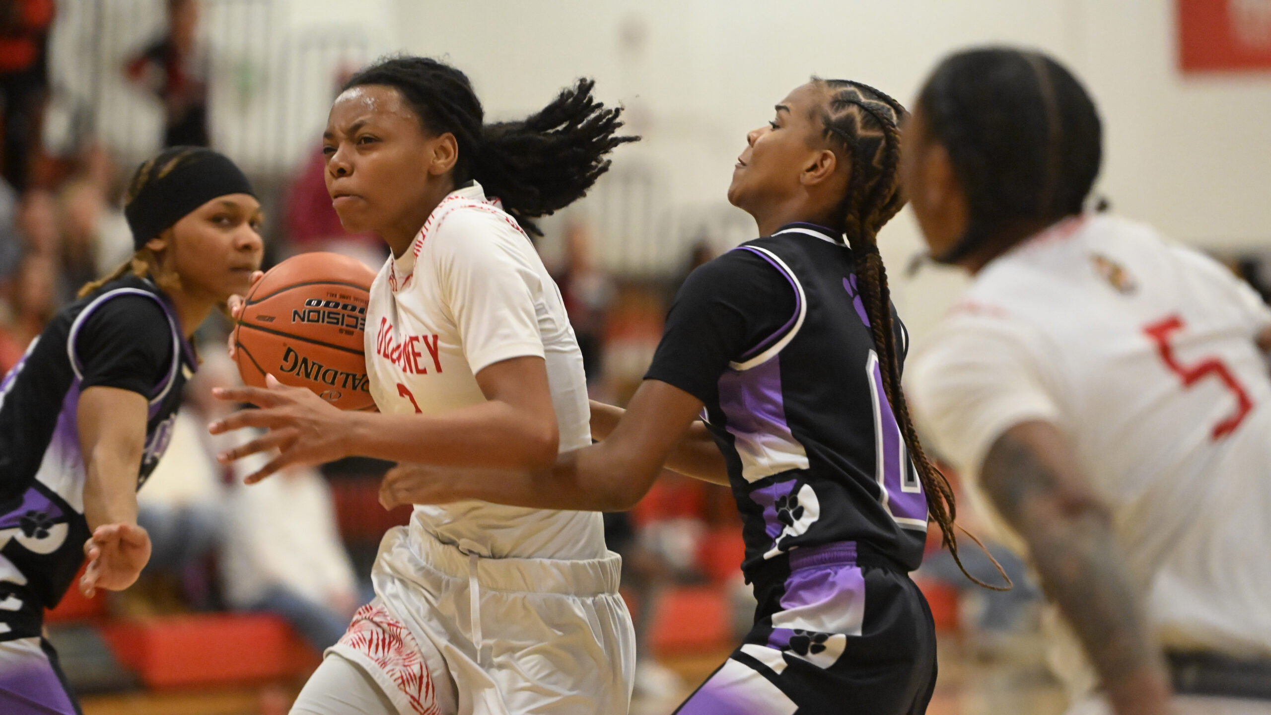 Dulaney's Morgan Young make a move to the basket with...