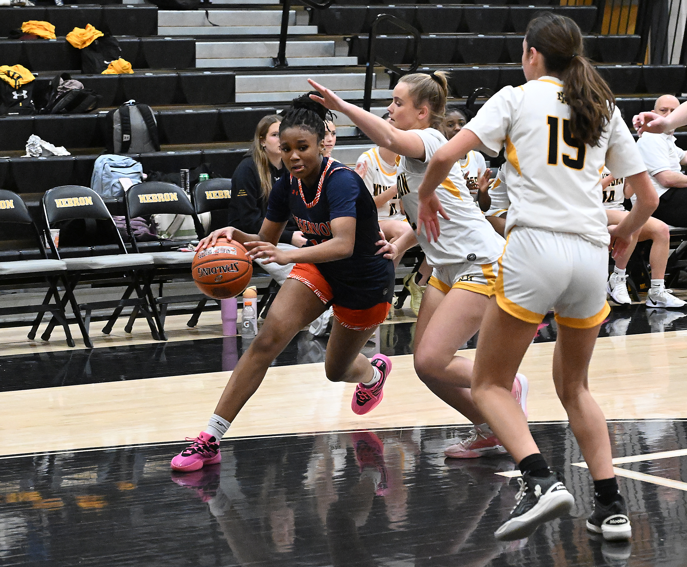 Reservoir #12, Sydney Shelton,drives towards the basket in the 1st...